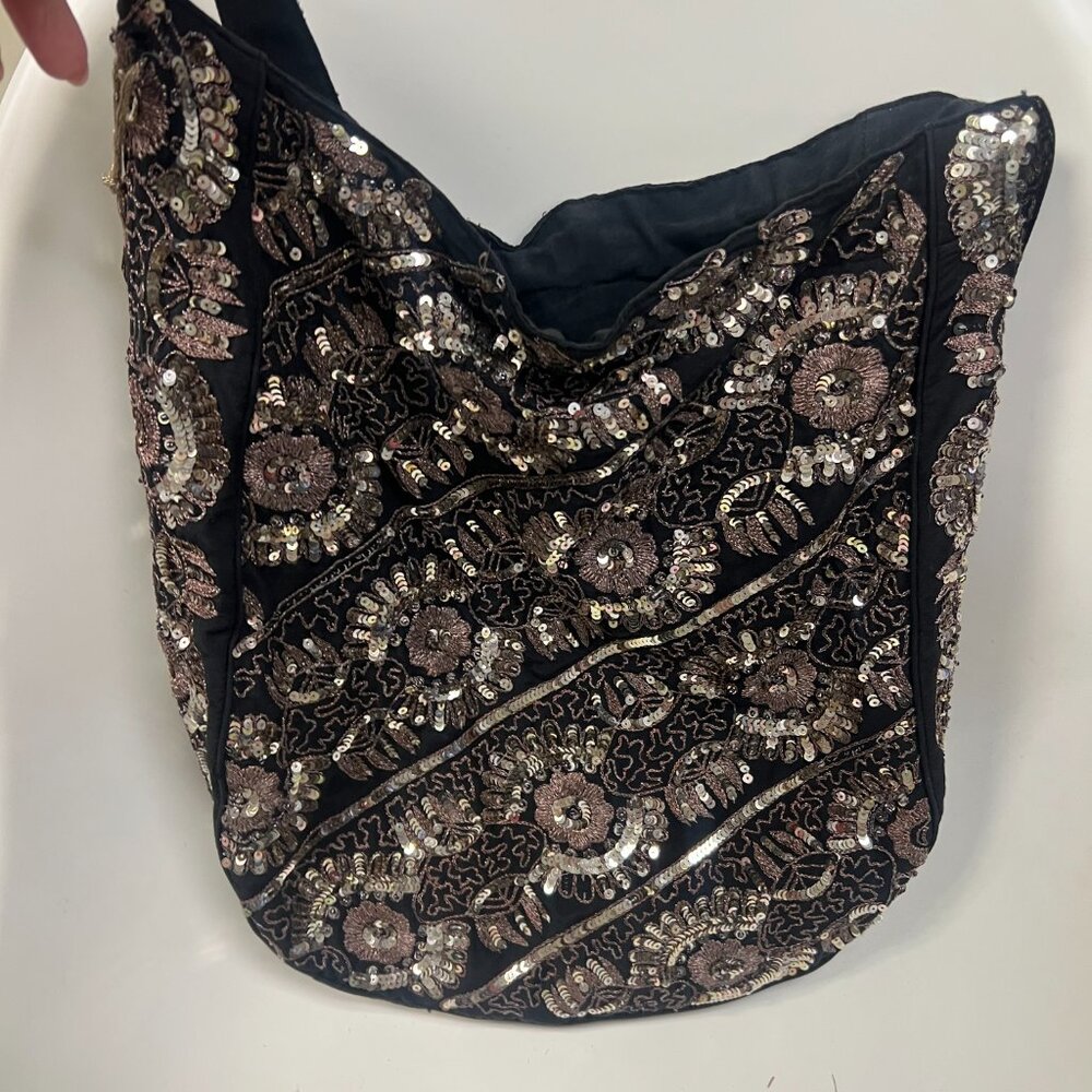 India Sequined hobo bag with amber glass bead tassels